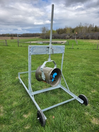 Ice Eater on Portable Galvanized Mount 450 - Pond Perfections Ice Eater mounted on a Portable Galvanized Mount 450 for efficient mobility and operation in ponds or lakes.