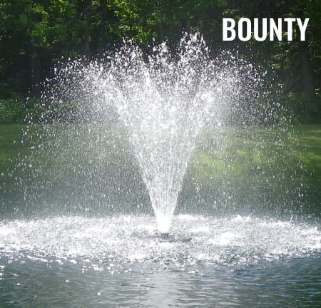 Bounty-Nozzle-450x432-1.jpg - Pond Perfections Bounty fountain nozzle creating a wide and graceful water pattern in a pond.