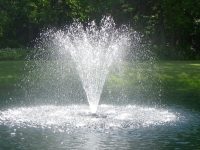 Olympus fountain with Bounty nozzle creating a vibrant water display