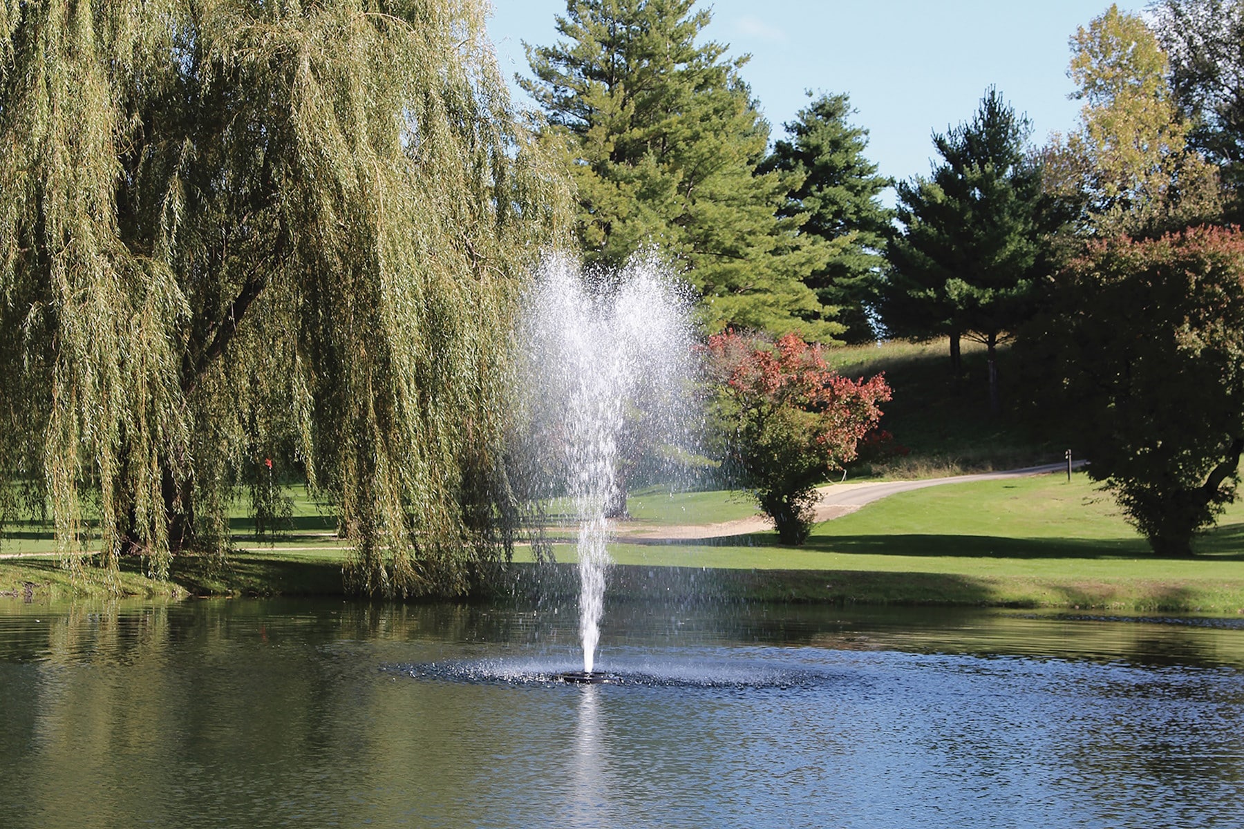 Kasco-4400-Sequoia - Pond Perfections Kasco J Series Decorative Fountain with Sequoia Nozzle in a scenic pond.