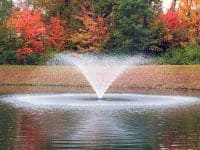Kasco VFX Pond and Lake Fountain during fall season with vibrant foliage.